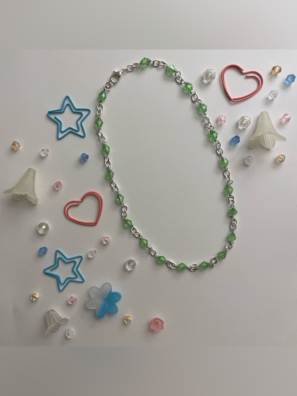 Silver chain necklace with green beads